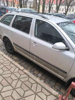 Škoda Octavia 2 rok 2005 77 kW km 384 - 14