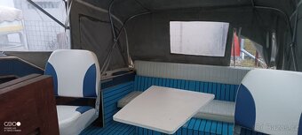 Kajutová motorová loď Wellcraft + přívěsný vozík - 14