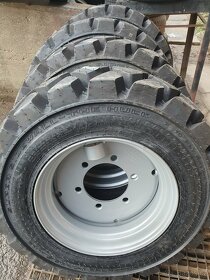 Kola smykový nakladač UNC - Locust - Novotný - 14