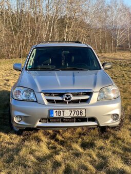 Mazda Tribute 2,3 - 14