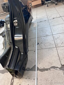 Čtvrtka (levá zadní blatník) BMW E91 - 14