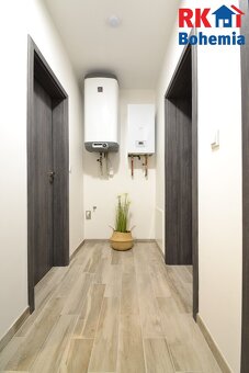 Pronájem novostavby bytu 2+kk s lodžií a parkovacím stáním v - 14