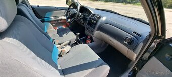 Mazda 323F BJ 2.0 96kw - 14