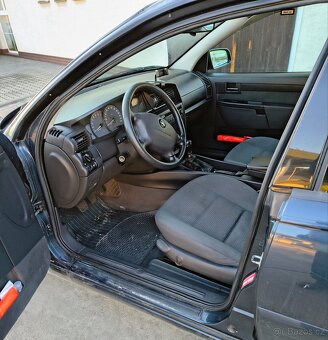 Opel omega - B caravan 2.2 benzín - 14
