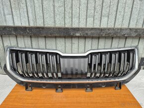 Škoda Karoq - přední nárazník, chladičovka.
 - 14