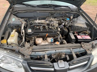Almera 1.5 benzín 2002 - 14