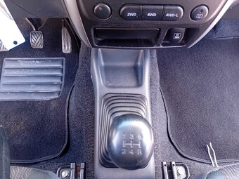 Suzuki Jimny 1.3 JLX AC 09/2014  SK ŠPZ - 14