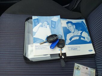 Ford Fusion 1.4i 59kw - 14