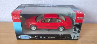 Modely aut 1/24 - Welly 2 - 14