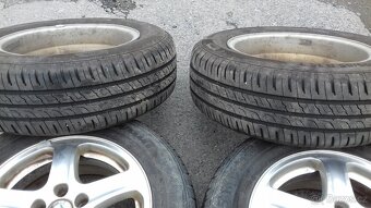 Škoda Octavia 1 sada originál alu + letní pneu 195/65/15 - 14