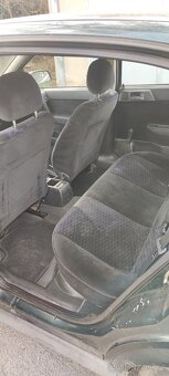 Prodám Opel Astra G  Obsah 14.16.V ,66 KW . Benzín - 14