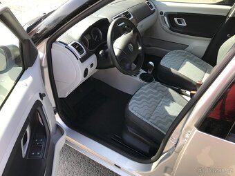 ŠKODA ROOMSTER 1. 4 MPI SERVISNÍ KNIHA - 14