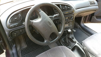Sleva na 6000 Kč - Ford Mondeo Combi Mk2 2.0 16V 96kW - 14