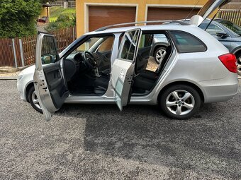Fabia 2 kombi 1.2tsi klimatronik alu tempomat edice family - 14