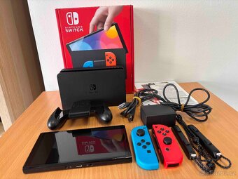 🎮 Nintendo Switch (OLED model) – Neon Blue / Neon Red - 14
