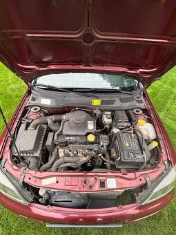 Opel astra 1.6. - 14