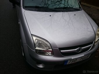 Suzuki Ignis 1.3 i 69kw r.v. 2007 - 14