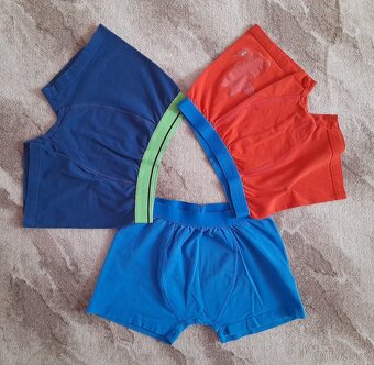 Balíček oblečení vel. 134. - 14