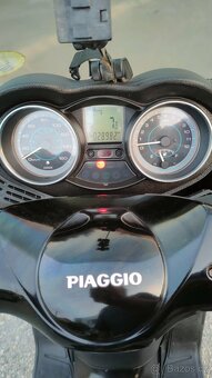 Piaggio Xevo 125 - 14