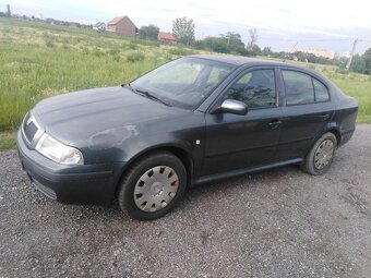 ŠKODA OCTAVIA  1. = 1,6i BENZIN 75 KW  TOUR - 14