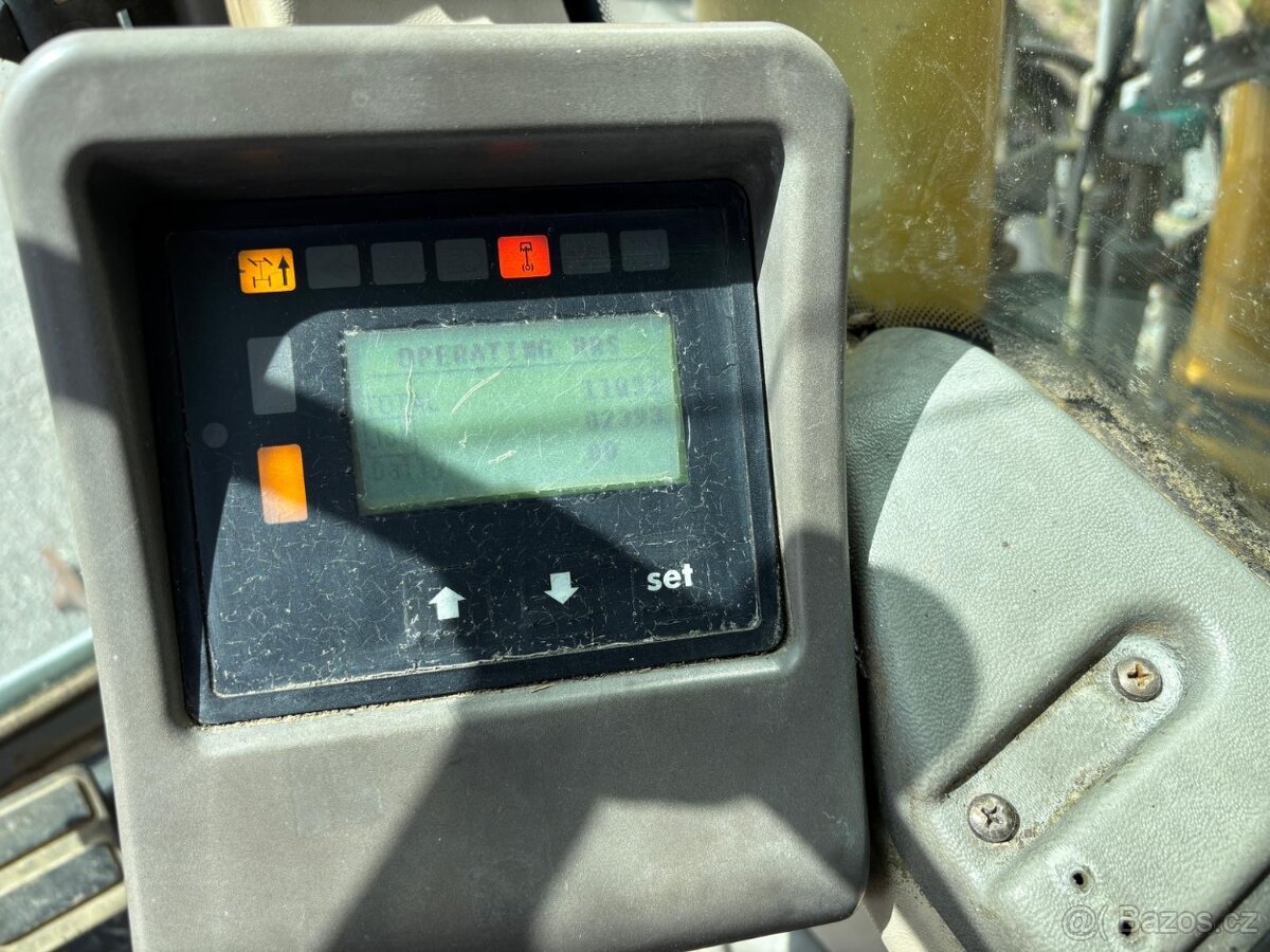 Kolové rypadlo / nakladač New Holland MH CITY - 15