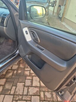 Mazda tribute  4x4 2.3i - 15