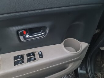 Daihatsu Sirion 4x4 1.3 16V, 64kW, 8/2006, klima - 15