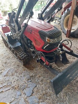 Nový multifunkční pásový traktor - 15