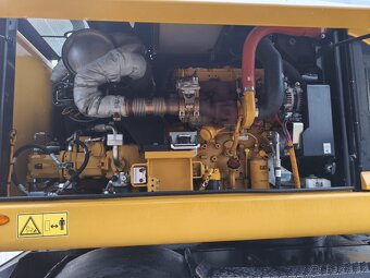 Kolový otočný bagr CAT M316 F - 15