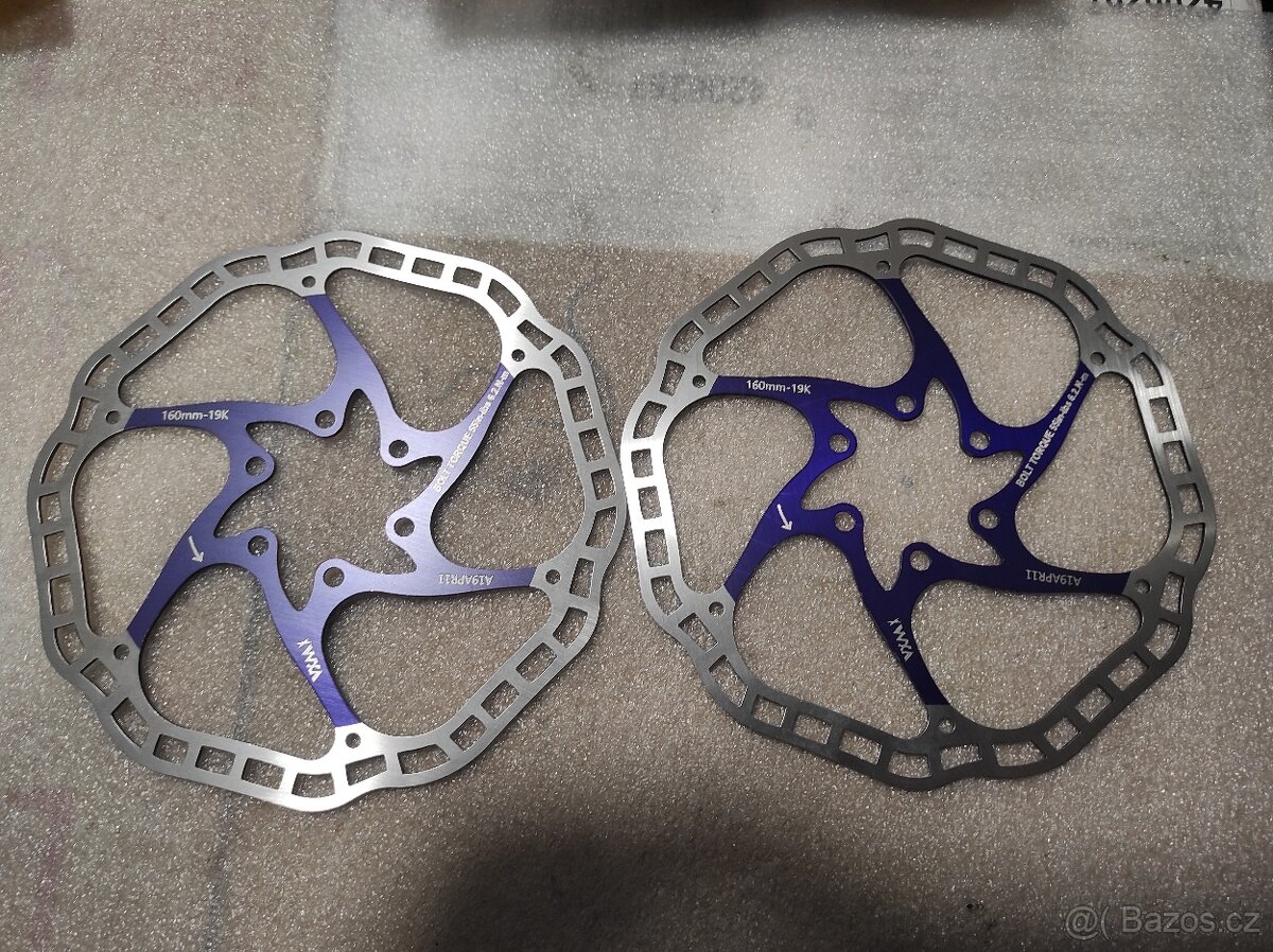 Spousta nových brzdových kotoučů 6 děr a CL. - 16