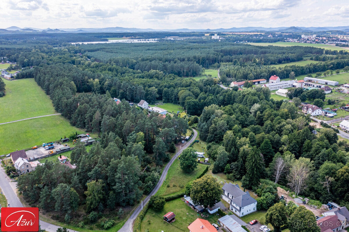 Rovinatý pozemek v krásné, zelené lokalitě - Ploužnice p. R. - 16