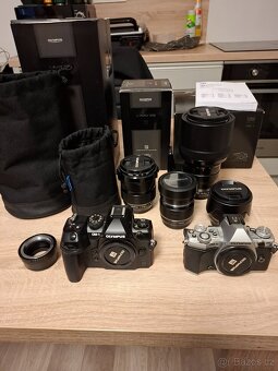 Olympus / System OM-1 + - 16