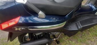Piaggio X evo 125 - 16