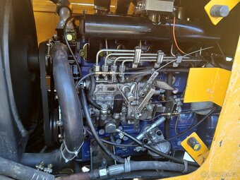 Traktorobagr Digger wz22-15. Nakladac - 16