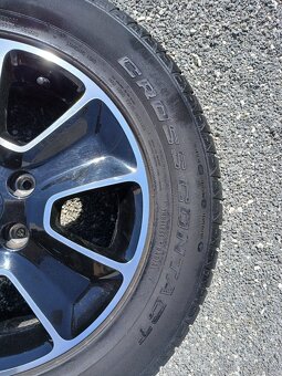 Pěkná letní orig alu kola Dacia Duster 215/65/16 vzorek 7mm - 16