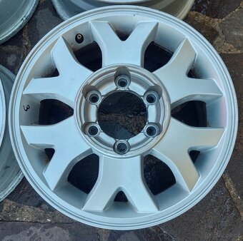 Litá kola originál 16" Ssangyong Rexton I. Tři typy - 16