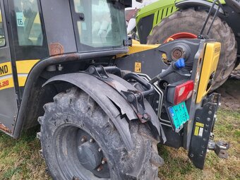 NEW HOLLAND TH 6.28 4X4 - 16