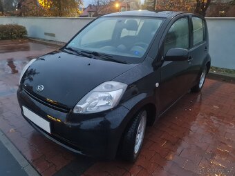 Daihatsu Sirion 4x4 1.3 16V, 64kW, 8/2006, klima - 16