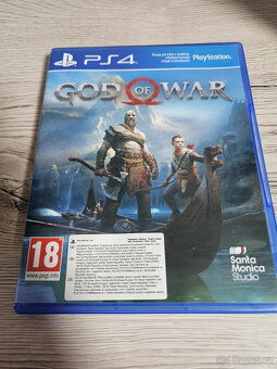 PlayStation 5 s mechanikou + God of War + stylový stojan - 16