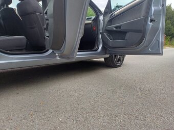 Benzínový Opel Astra 1.8..16V... Tempomat - 16