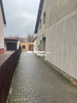 Prodej krásného bytu 3+1 s lodžií, garáží a půdou - 16