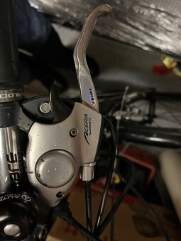 Dvě treková jízdní kola ( pánské a dámské) - 16