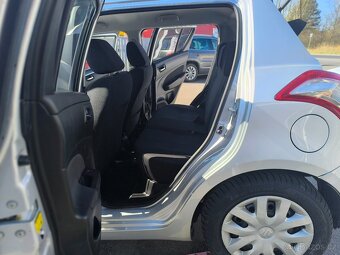 Suzuki Swift 1.3 DDiS 55kW Comfort,AAC,Temp,Keyless,1maj - 16