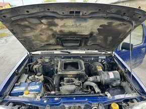 Prodám na Nissan Navara D22 4x4 2,5 nafta 98 KW rv 2003 - 16