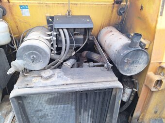 KOMATSU 344 4X4 - 16
