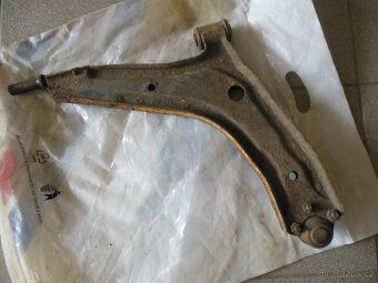 Zapalovací cívka, třmem zadní nápravy.pružiny, ložisko - 16