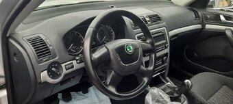ŠKODA OCTAVIA 1.6(75kw) SLEVA(zadní dveře v elekt - 16