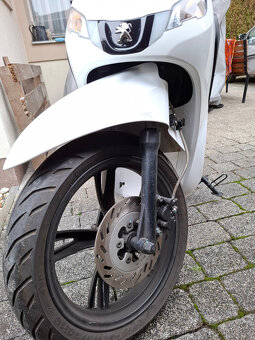 Peugeot Tweet 125i - 16