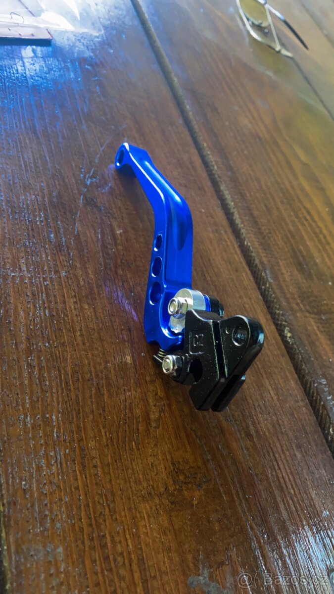 Držák na mobil,závažíčka do řídítek ,páčky - 17