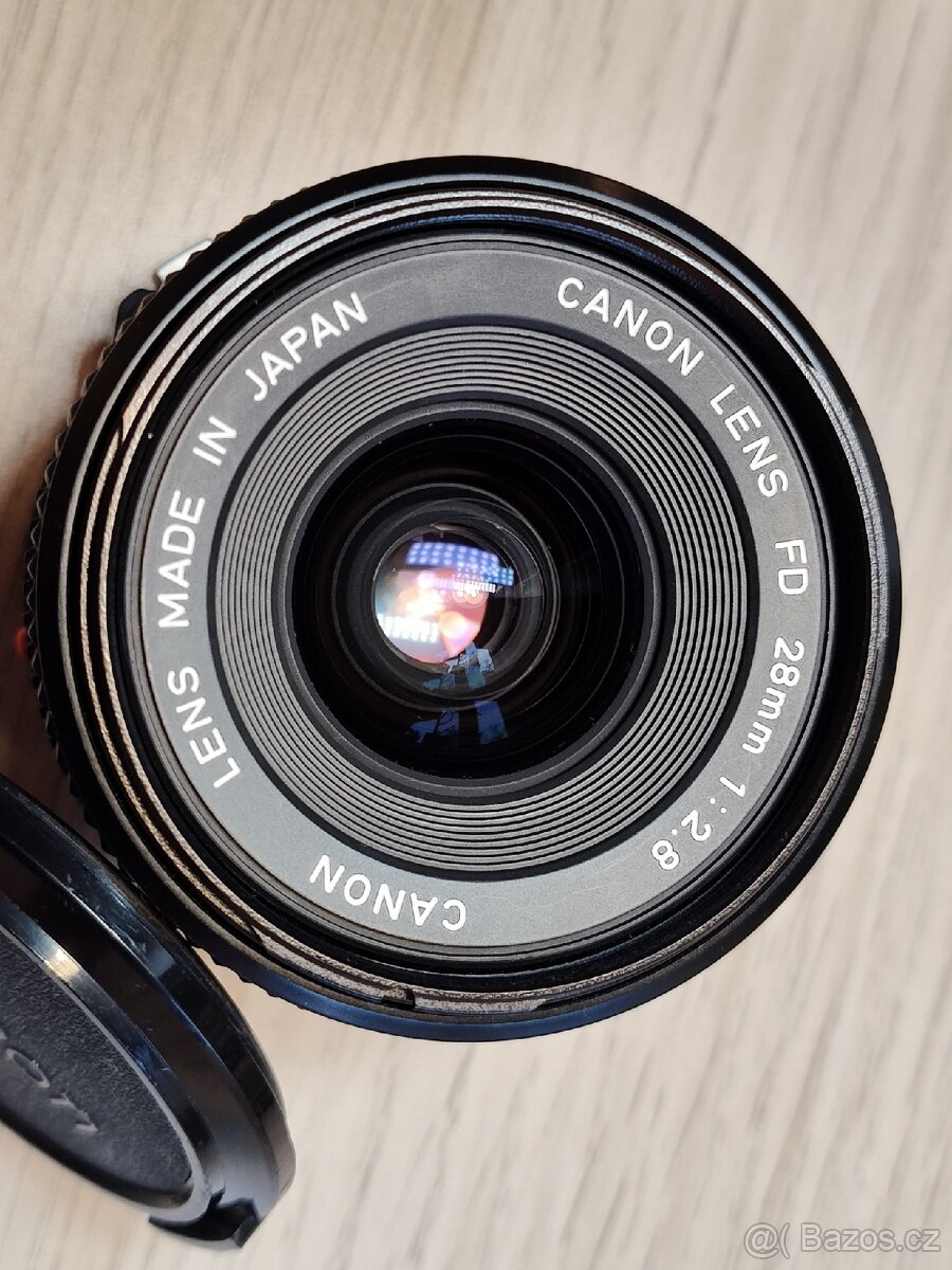 Canon A-1 + FD 28mm + příslušenství - 17